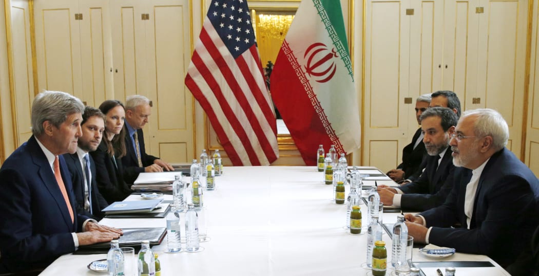 US Secretary of State John Kerry, left, meeting with Iranian Foreign Minister Javad Zarif, right, in Vienna, Austria on 16 January 2016.