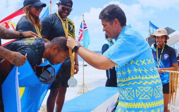 President Whipps presenting a medal at the 2025 Pacific Mini Games in Plaau. 1 July 2025