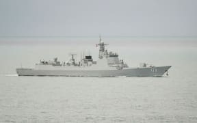 A Chinese PLA-N Luyang-class guided missile destroyer leaves the Torres Strait and enters the Coral Sea on 18 February in this image supplied by the Australian Defence Force.