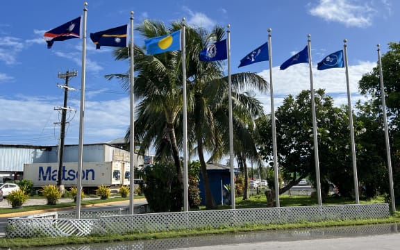 Flags from most of the Micronesian islands participating in the regional summit this week fly outside the International Conference Center in Majuro on Monday. Photo: Giff Johnson.