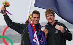 New Zealand sailors Blair Tuke and Peter Burling on the 2012 Olympic medal podium.