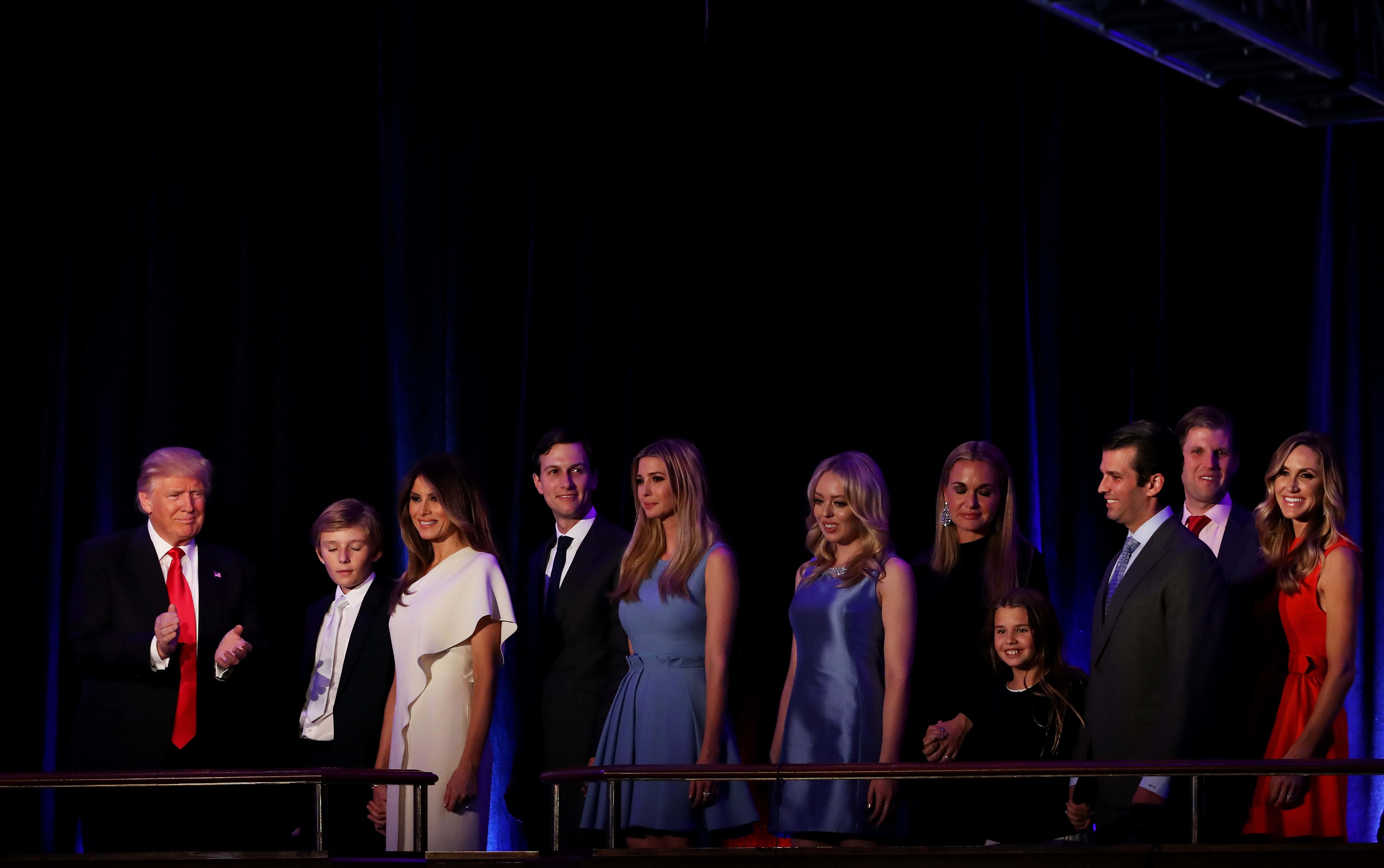 Donald Trump, supported by his family, makes his acceptance speech after winning the US presidential election.