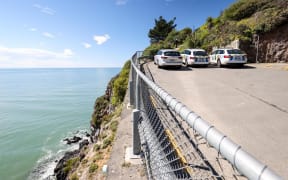 Police working near where a body was found by the Christchurch coast.