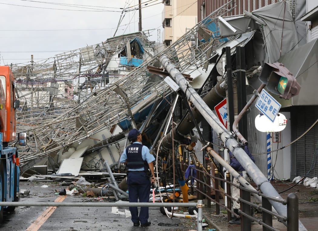 The strongest typhoon to hit Japan in 25 years made landfall on September 4, the country's weather agency said, bringing violent winds and heavy rainfall that prompted evacuation warnings.