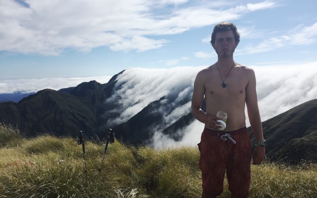Callum Barnes takes a break during his 3000km trek through NZ.