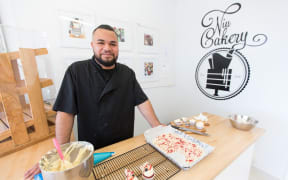 Niuafe Malupo with a couple of red velvet cupcakes - one of the most popular flavours.