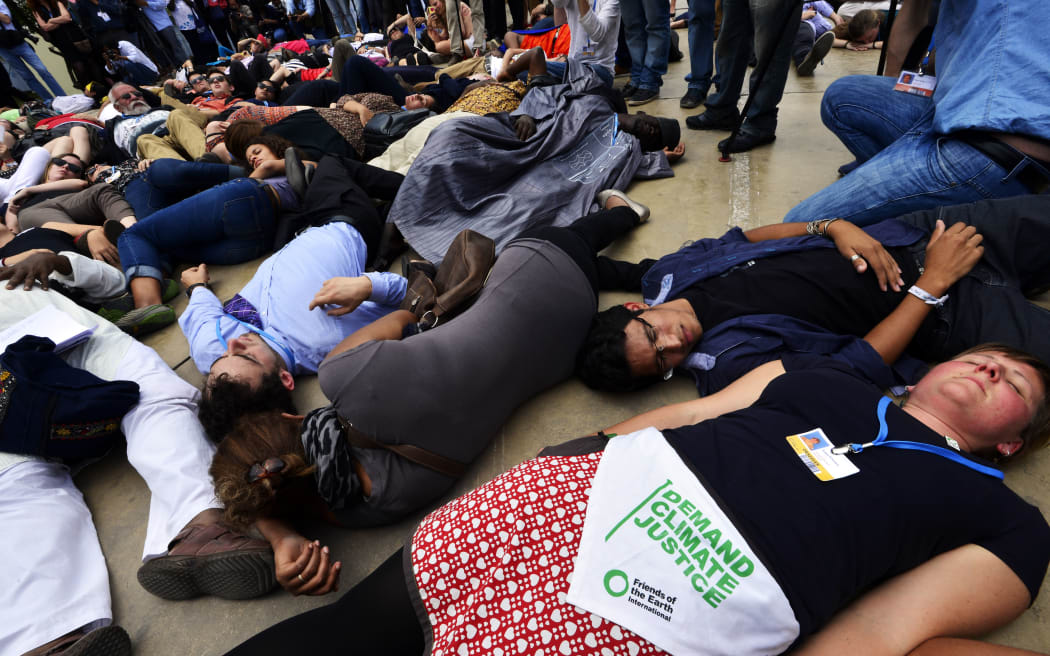 Activists demonstrate on the sidelines of the UN climate change conferences in Lima