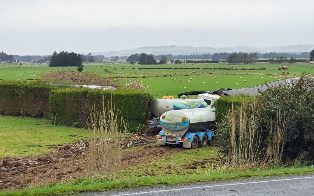 The truck crashed into a house after colliding with a car on State Highway 1 at Edendale