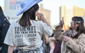 Fans of US singer Taylor Swift, also known as Swifties, gather outside the Tokyo Dome shortly before the start of the first leg of her Asia-Pacific "Eras Tour" in Tokyo on February 7, 2024. (Photo by Richard A. Brooks / AFP)