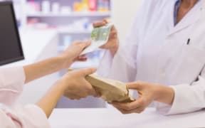 Some pharmacies are charging consumers 20 cents to $1 more per prescription than their contract entitles them to.