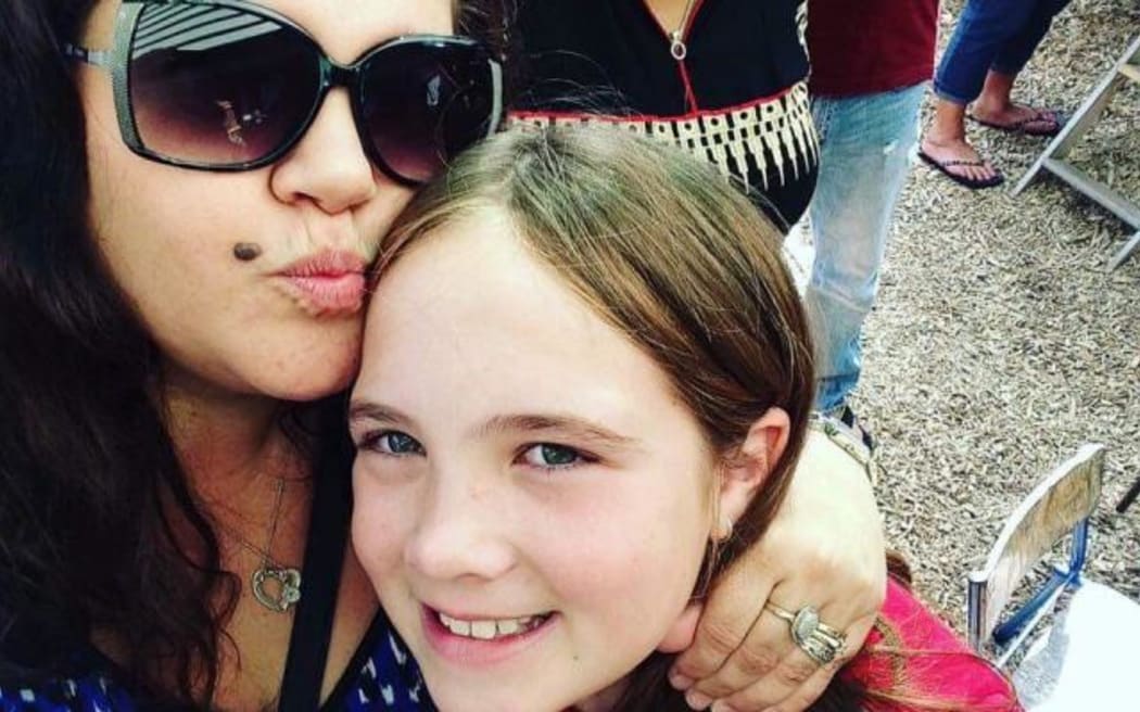 Young bus crash victim Hannah Francis and her mum Michelle.