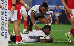 Fiji's wing Josua Tuisova scores a try during the France 2023 Rugby World Cup Pool C match between Wales and Fiji at Stade de Bordeaux in Bordeaux, south-western France on September 10, 2023.