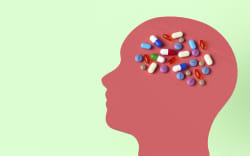 Conceptual illustration showing drugs that target the human brain to treat neurological disorders.