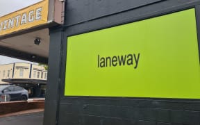 A Laneway Festival promotional billboard is seen in Auckland's Ponsonby on 2 October, 2024.