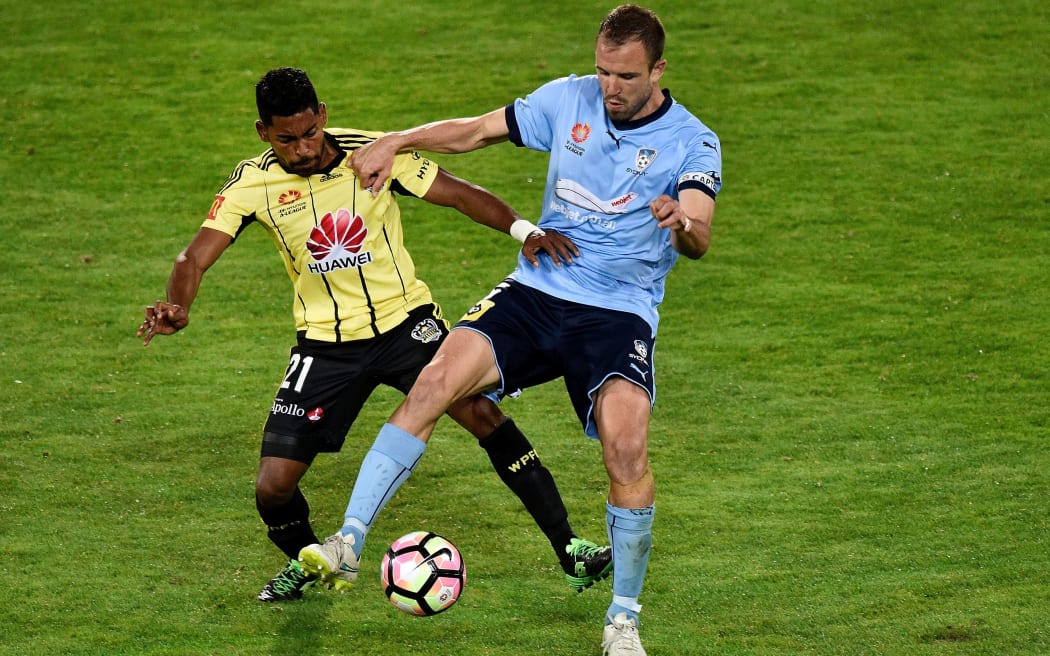 Sydney celebrate their last-minute goal against the Wellington Phoenix during the match in Wellington.