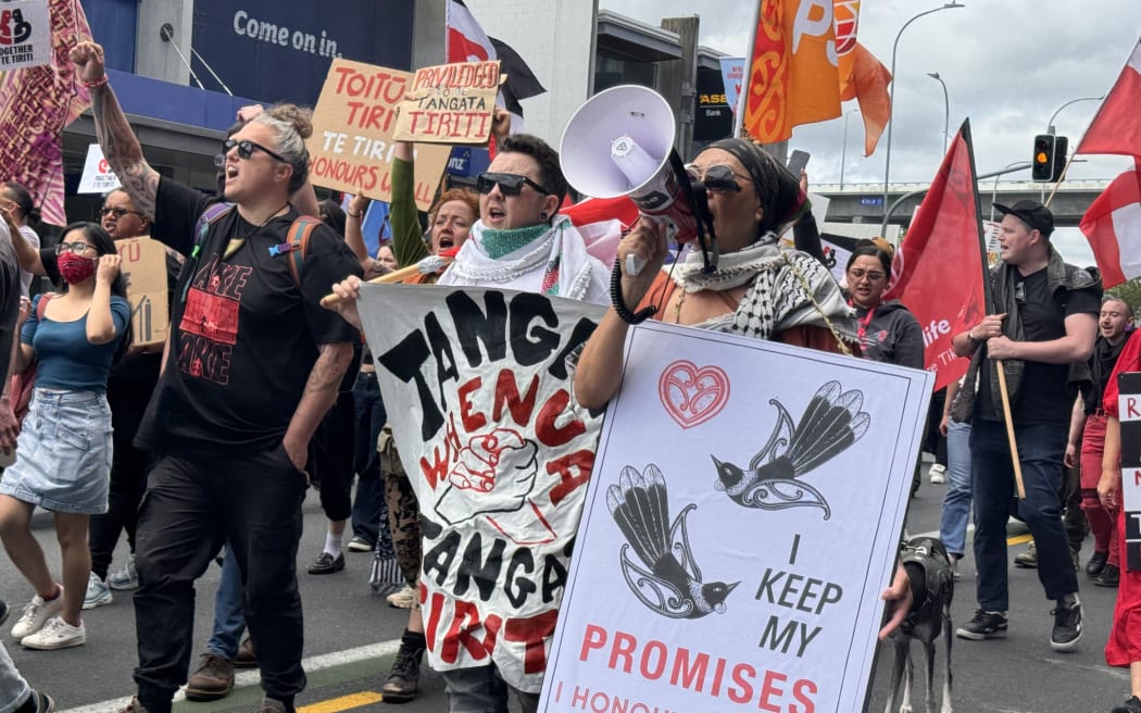 United for Te Tiriti spokesperson Bianca Ranson (left) chants “Ka whawhai tonu mātou" as crowds rally along New Market, capturing support from onlookers.