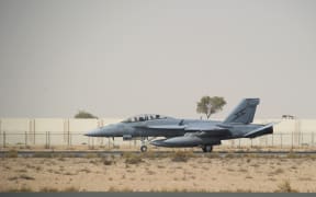 A Royal Australian Air Force F-18 Super Hornet lands at Australia’s main support base in the Middle East.