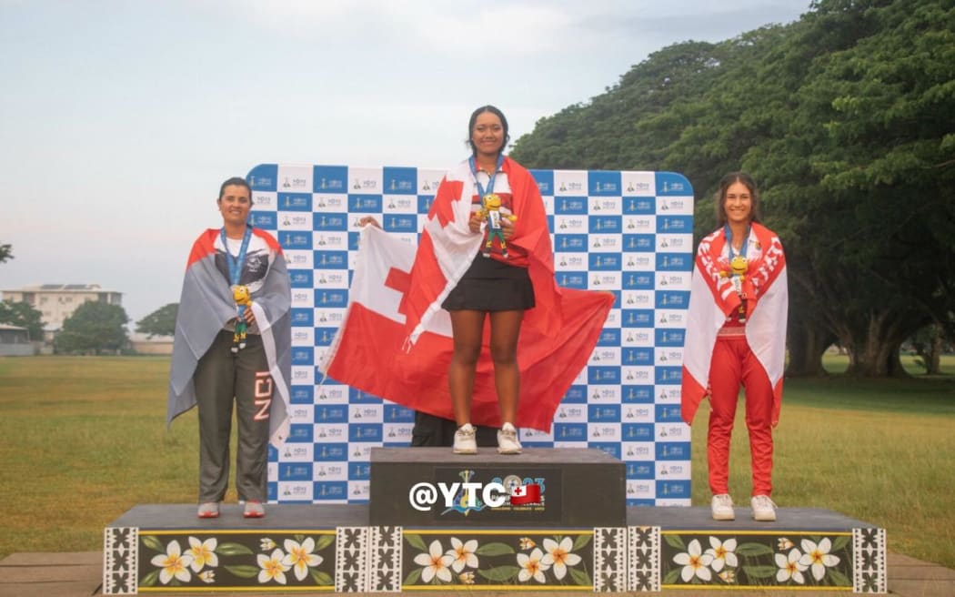 Vakasiuola, middle, was competing at her first Pacific Games.