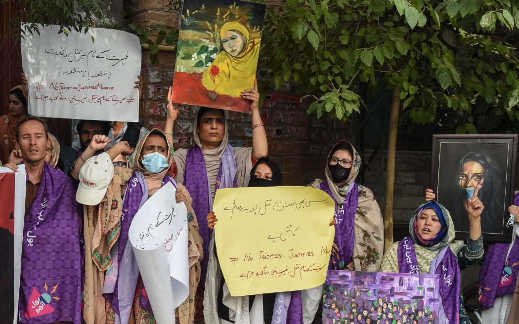 Human rights activists shout slogans during a protest in Quetta on July 26, 2025, against the alleged honour killing of a couple last month in Margat near Quetta in Balochistan, after eloping. More than a dozen men have been arrested in southwestern Pakistan for alleged involvement in the so-called "honour killing" of a couple after a video of the murders went viral on social media, a police official said on July 21. (Photo by Banaras KHAN / AFP)