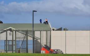 Young people on the roof at Korowai Manaaki Youth Justice Residence in Wiri, Auckland, 2 July 2023.