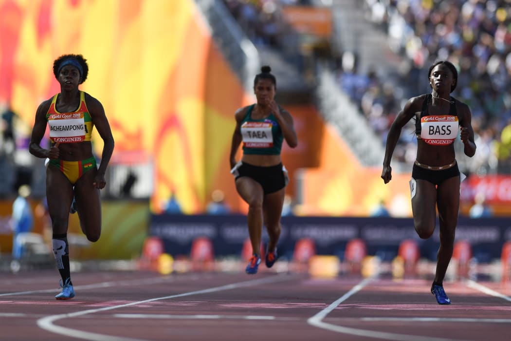 Patricia Taea (c) competes in the women's 100m heats during the 2018 Gold Coast Commonwealth Games.