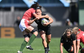 Portia Woodman makes a run at the Welsh defence in the 2022 Rugby World Cup.