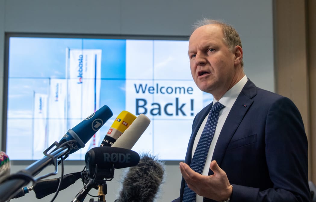 Webasto CEO Holger Engelmann gives a press statement in the foyer of the building as it reopens after closing for two weeks due to an outbreak of Covid-19.