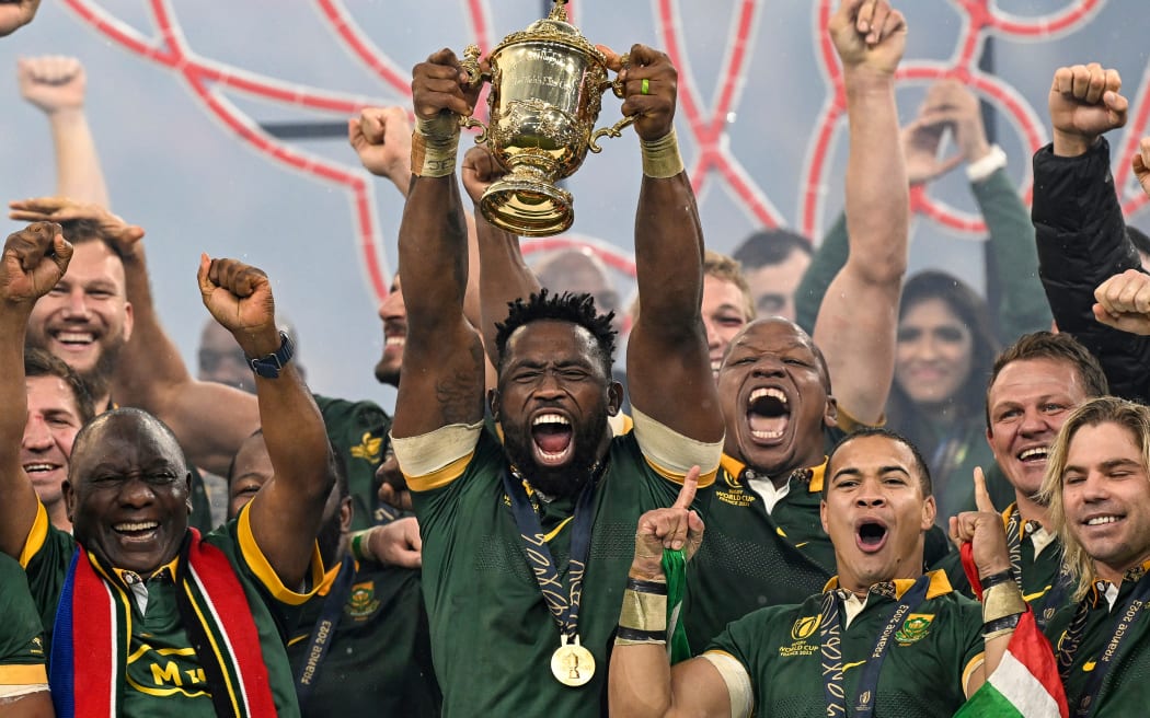 Siya Kolisi (captain) of South Africa lifts the Rugby World Cup Trophy to celebrate winning the final. Rugby World Cup France 2023, New Zealand All Blacks v South Africa FInal match at Stade de France, Saint-Denis, France on Saturday 29 October 2023. Photo credit: Andrew Cornaga / www.photosport.nz
