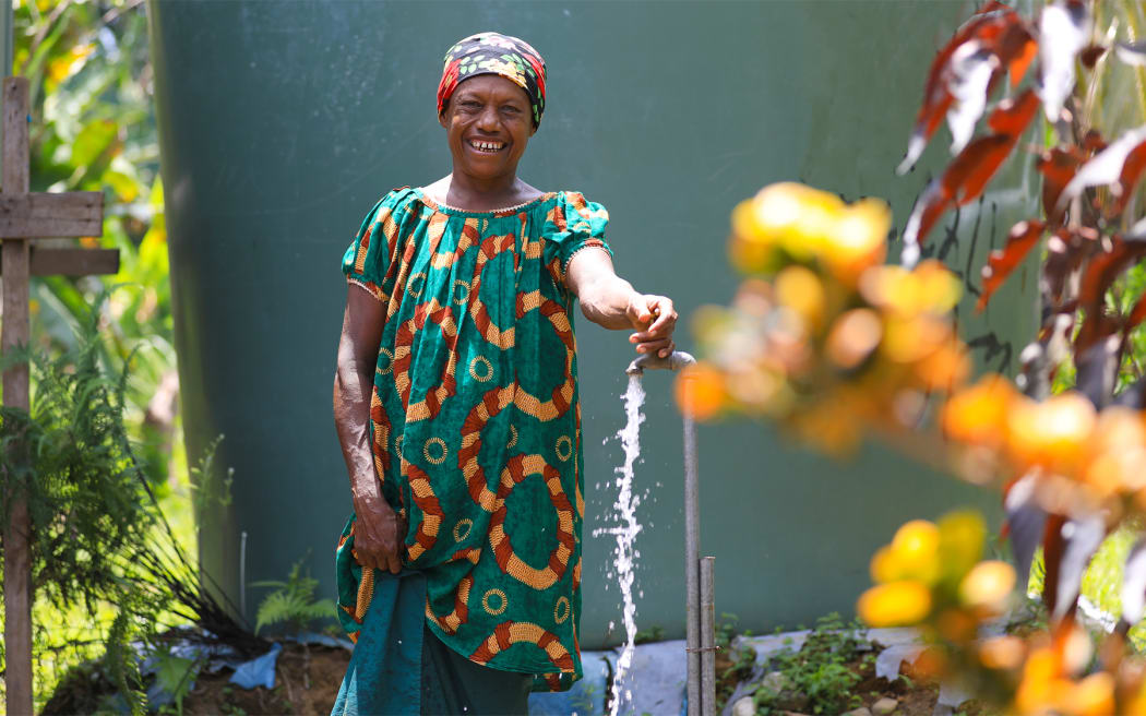 Mrs Kausa, a teacher at the Bialla Primary School, is one of 5,000 people now accessing clean running water following a World Bank-supported project