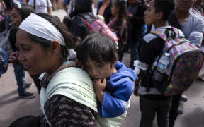 Central American migrants traveling in the "Migrant Via Crucis" caravan are pictured as they head to El Chaparral border crossing in Tijuana, Baja California state, Mexico, on April 29, 2018.