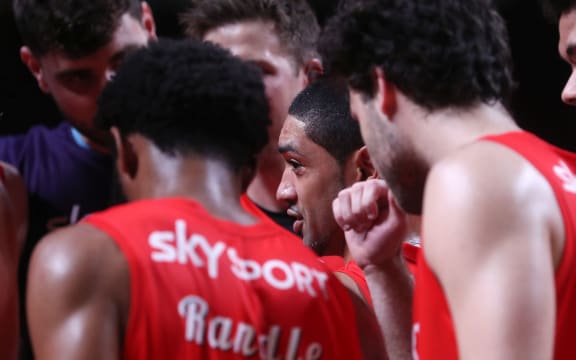 Peyton Siva of the Breakers talks to his team mates