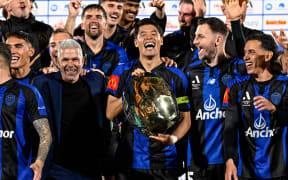 Auckland FC Manager Steve Corica and Hiroki Sakai of Auckland FC with the A-League Plate Trophy, 2025.