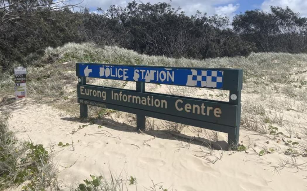Police say the woman's body was surrounded by dingoes.