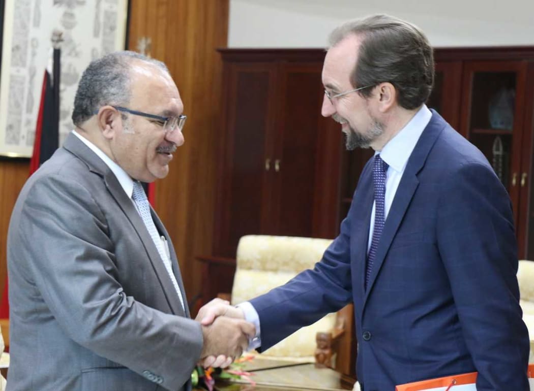 UN High Commissioner for Human Rights, Zeid Ra'ad Al Hussein (right) meets PNG Prime Minister Peter O'Neill.