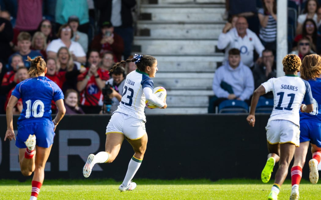 Bianca Silva of Brazil scores her side's first try against France in a Women's Rugby World Cup pool match in Exeter, 31 August, 2025. (Photo by Simon King / ProSportsImages / DPPI via AFP)