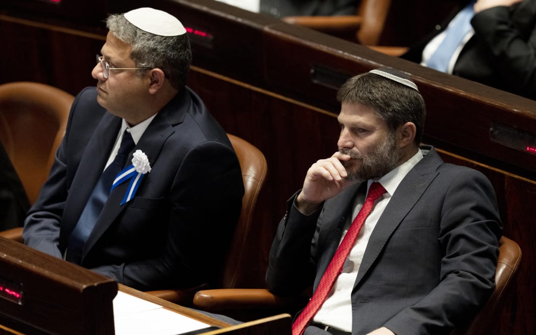 Israeli right-wing Knesset member Itamar ben Gvir (L) and Bezalel Smotrich (R) are pictured during the swearing in ceremony of the new Israeli government at the Knesset (Israeli parliament) in Jerusalem, in 2022.