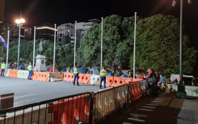 Police at the site of the protest at Parliament on Thursday night.
