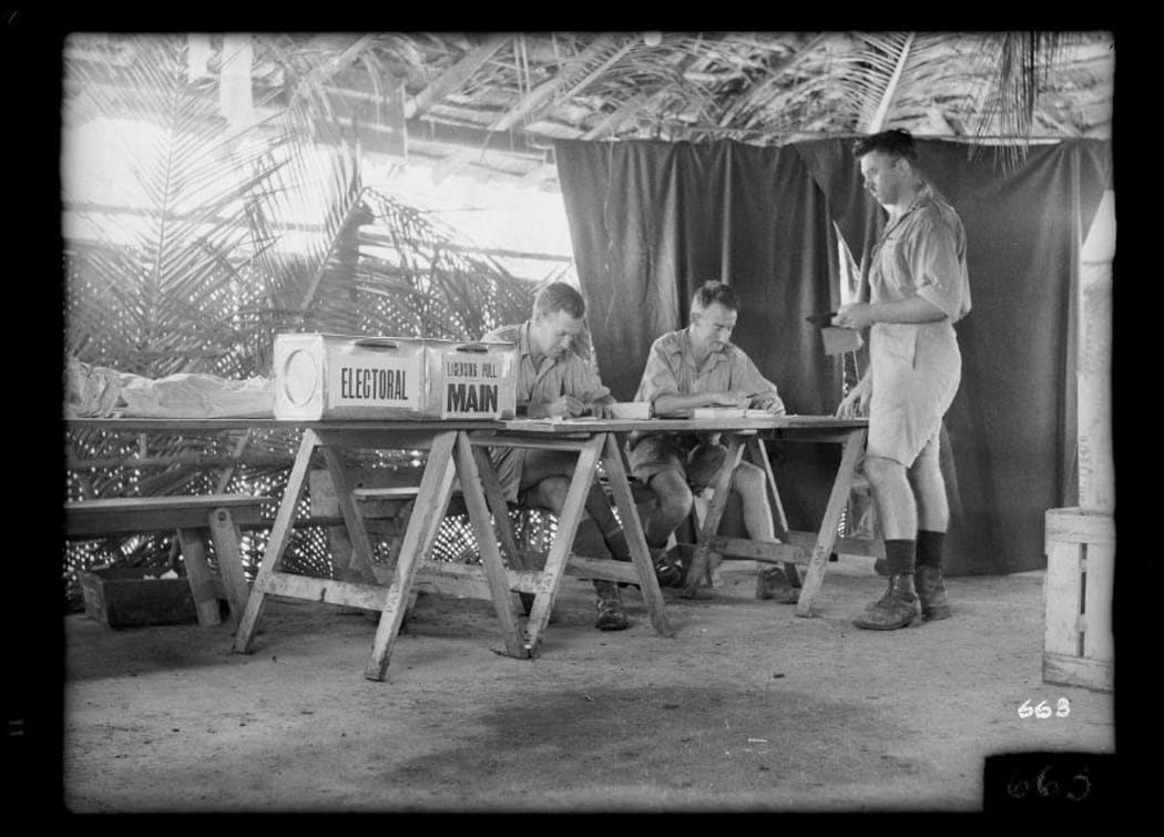 Polling booth interior in the Pacific for World War II soldiers voting in the 1943 New Zealand general elections  (Permission of the Alexander Turnbull Library, Wellington, New Zealand, must be obtained before any re-use of this image.)