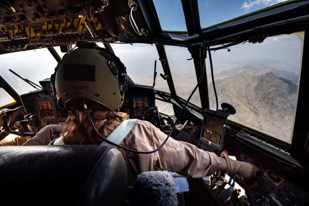 An RNZAF C130 landed in Kabul Afghanistan today and safely evacuated a number of New Zealanders and Australians.

Co-pilot Flight Lieutenant Michal-Louise Repko concentrating on the descent into Kabul.