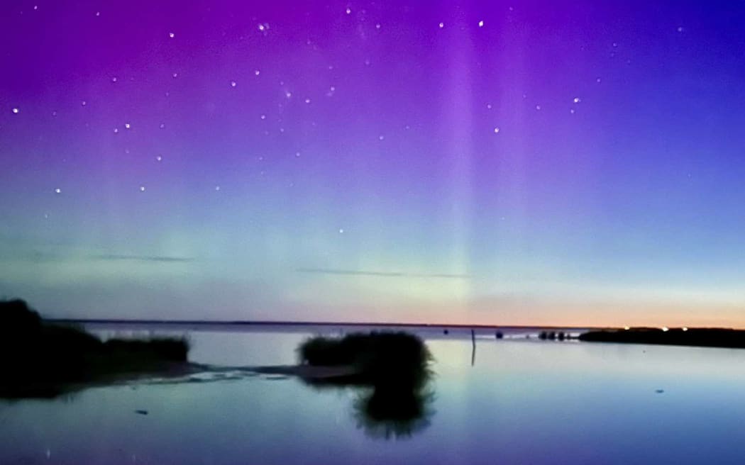 An image of the aurora australis taken with an iPhone 14 at Lake Ellesmere, Canterbury on 11 October 2024.