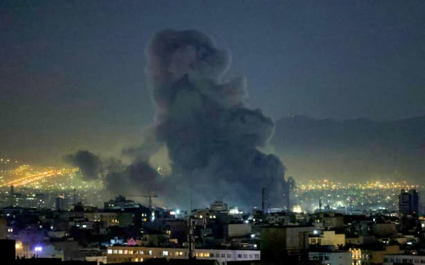 Smoke plumes rise following missile strikes in Tehran on March 1, 2026. The United States and Israel launched strikes against Iran on February 28, killing Iran's supreme leader and top military leaders, prompting authorities to retaliate with strikes on Israel and US bases across the Gulf.