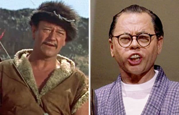 (L-R) John Wayne as Genghis Khan in The Conqueror (1956) and Mickey Rooney as Mr. Yunioshi in Breakfast at Tiffany’s (1961).
