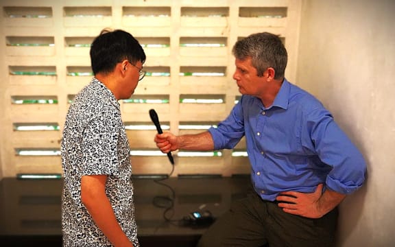 Ooi Kok Hin talking to Colin Peacock in Kuala Lumpur.