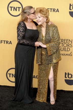 Carrie Fisher, left, and her mother Debbie Reynolds.