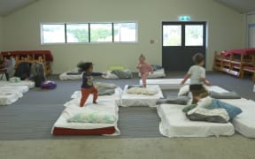 Children play at an evacuation centre set up at Hakatere Marae