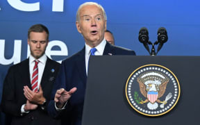 US President Joe Biden gestures after speaking during the Ukraine Compact initiative on the sidelines of the NATO Summit at the Walter E. Washington Convention Center in Washington, DC, on July 11, 2024. (Photo by SAUL LOEB / AFP)