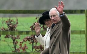 Britain's King Charles III and Britain's Queen Camilla waves as they leave after attending a service at St Mary Magdalene Church on the Sandringham Estate in eastern England on 11 February, 2024. Britain's King Charles III on Saturday expressed his 'heartfelt thanks' to well-wishers, in his first statement since his shock announcement that he has cancer.