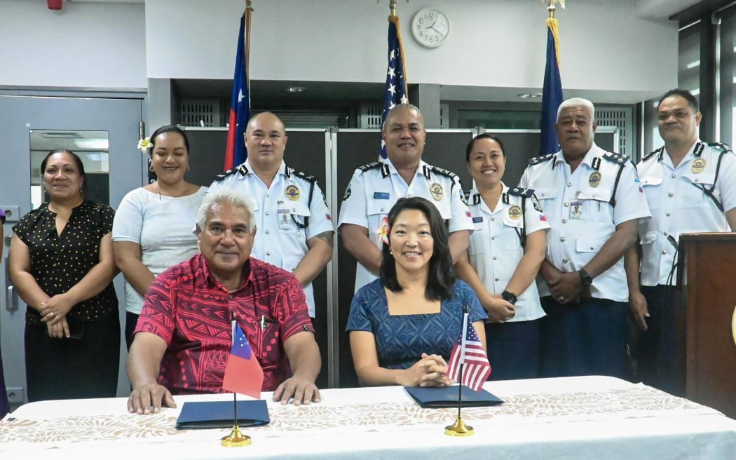 Group Photo (Seated) Honorable Faualo Harry Schuster and U.S. Chargé d’Affaires Noriko Horiuchi with the Ministry of Police, Prisons and Corrections Services Executive.