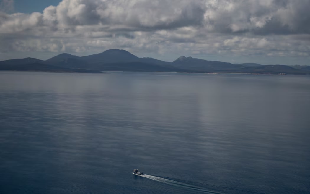 A barge brings supplies to the islands of Bass Strait.