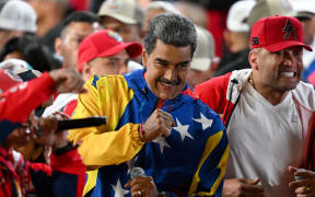 Venezuelan President and presidential candidate Nicolas Maduro reacts following the presidential election results in Caracas on 29 July, 2024.